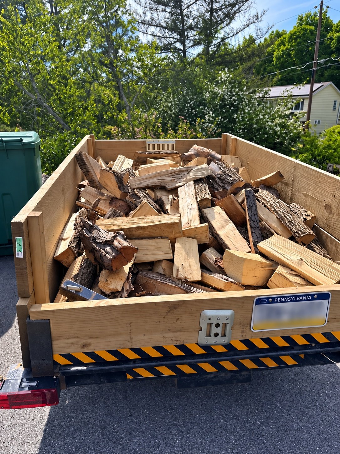 Trailer loaded with freshly split hardwood for a mini load delivery